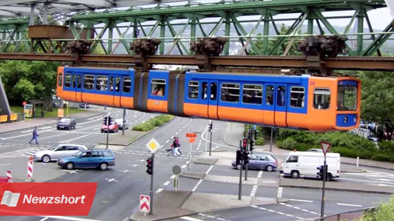 Hanging Train,ঝুলন্ত ট্রেন,জার্মানি,Germany,বাংলা খবর,Bangla Khobor,Bengali Khobor,Bangla,Bengali