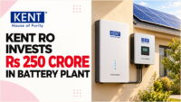 Kent New Energy lithium battery and hybrid inverter units mounted on a wall with rooftop solar panels, after Kent RO invested Rs 250 crore in a Noida plant