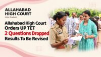 Candidates queue at a UP TET exam centre as the Allahabad High Court orders marks to be recalculated